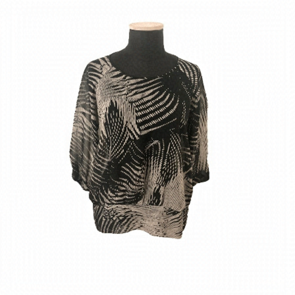 RICKI’S black and tan patterned top